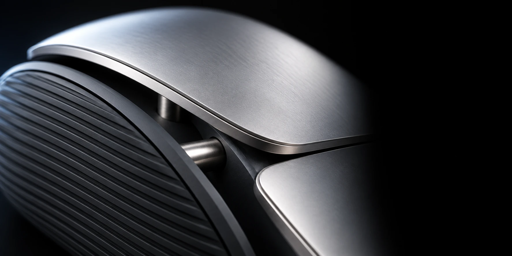 Close-up of Palmform's silver palm rest, metal supports and dark textured grips